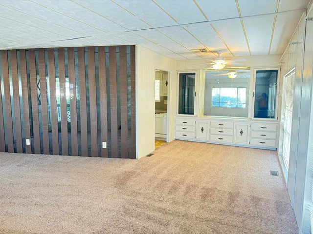 a view of a room with a bathroom