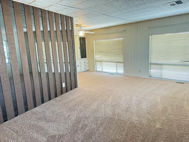 a view of a room with stairs