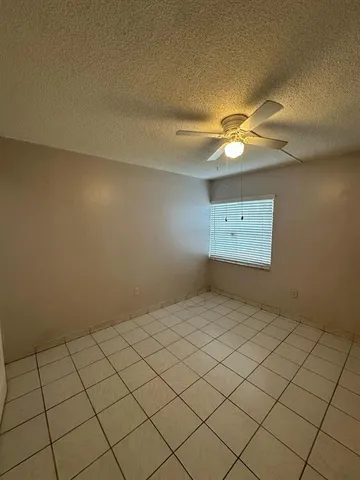 en empty room with fan