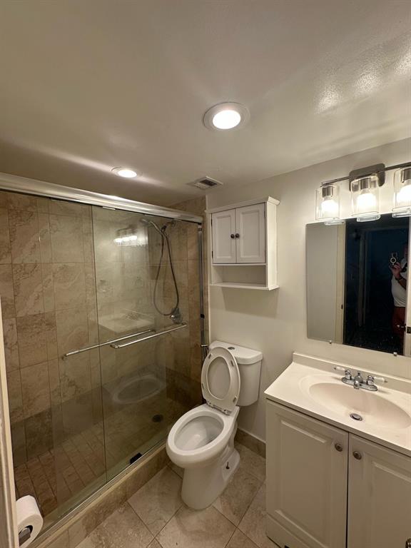9331 Southwest 4th Street, Unit 104B Miami, FL 33174 - Photo 9 of 11 a bathroom with a sink toilet and shower