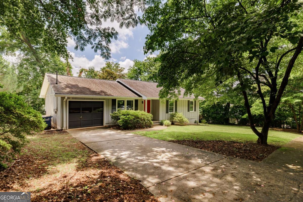 168 Pearl Street Athens, GA 30601 - Photo 4 of 43 a front view of a house with a yard