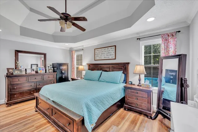 a bedroom with a bed and a dresser