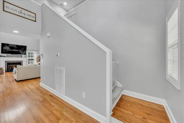 a view of a livingroom with furniture and a window