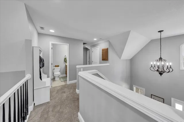 a bathroom with a sink a mirror and a shower