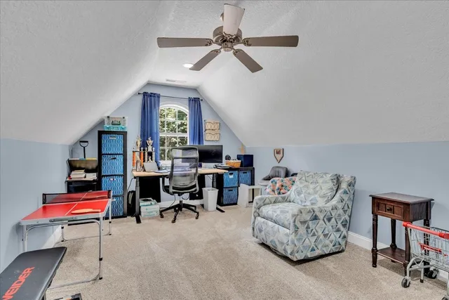 a room with furniture and a window