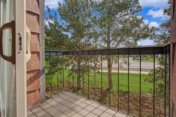 a view of a balcony with lake view