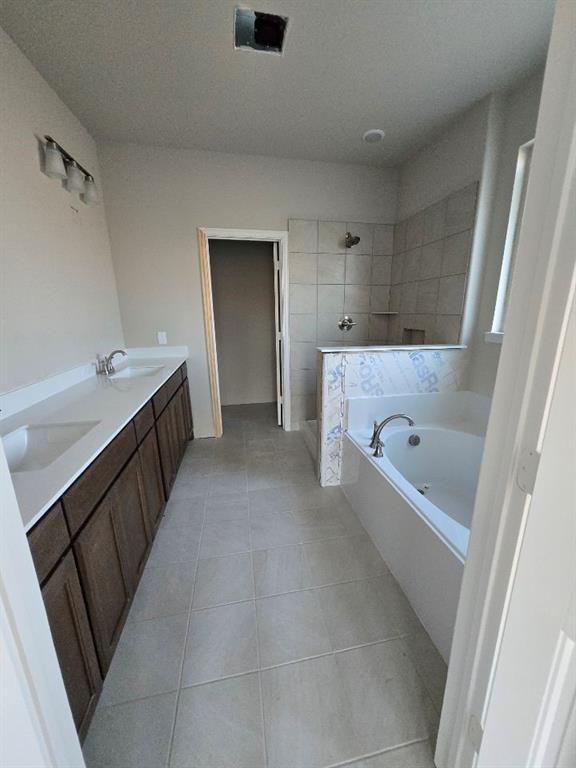 111 Hillview Trail Decatur, TX 76234 - Photo 18 of 20 a bathroom with a tub sink and mirror