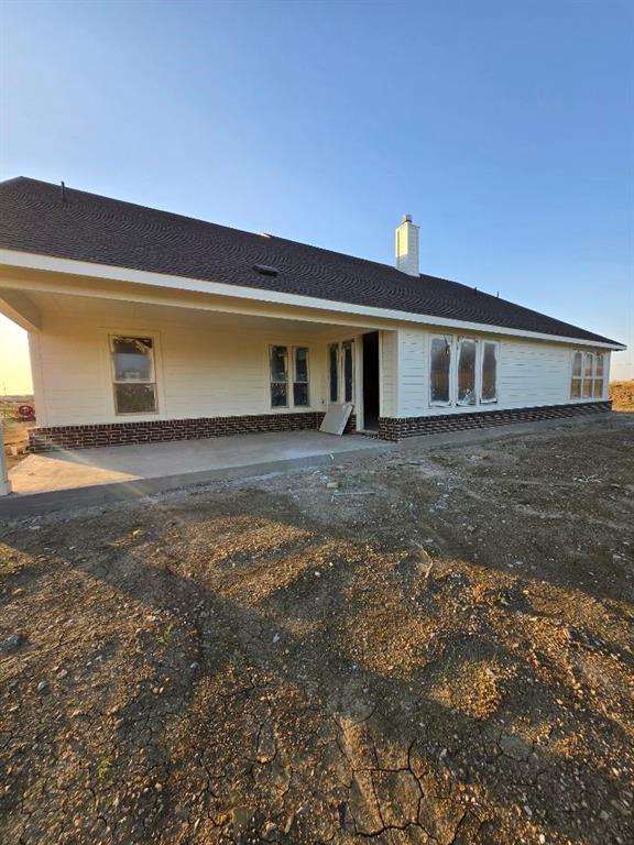 111 Hillview Trail Decatur, TX 76234 - Photo 19 of 20 a front view of a house with yard