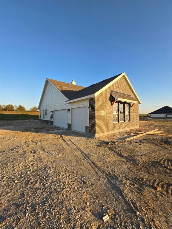 111 Hillview Trail Decatur, TX 76234 - Photo 3 of 20 a backyard of a house