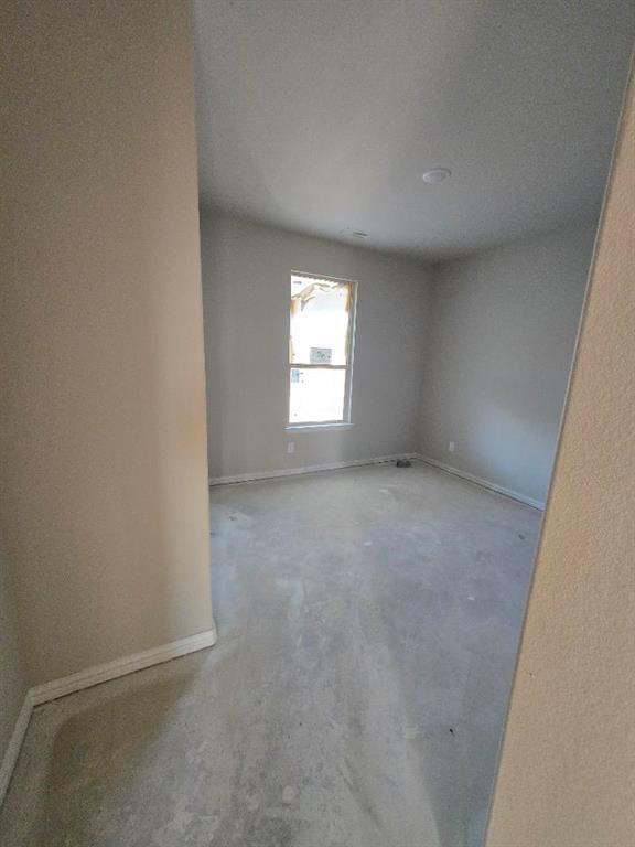 111 Hillview Trail Decatur, TX 76234 - Photo 9 of 20 an empty room with windows