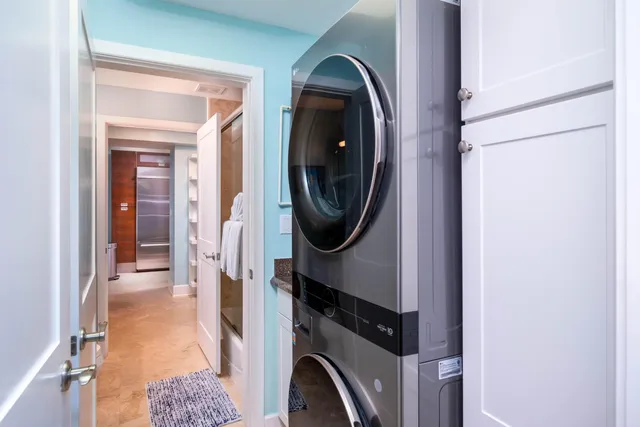 a view of a patio with table and chairs and potted plants