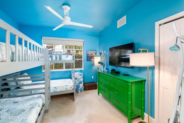 a view of a garden with sitting area