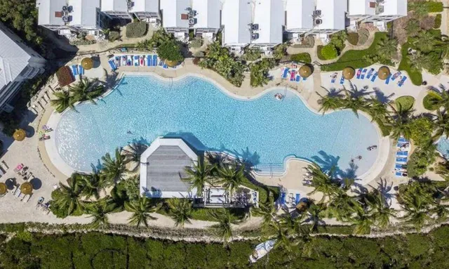 a vase of flowers sitting on a table