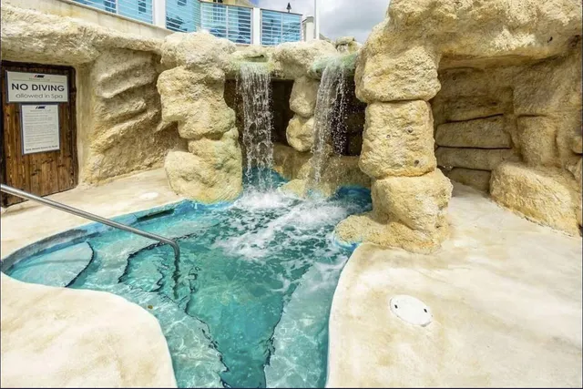 a workspace with furniture window and wooden floor