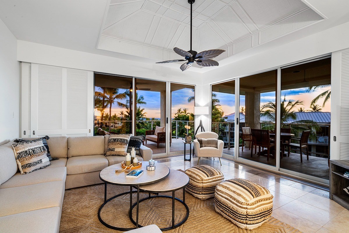 69-1010 Keana Place, Unit C304 Waikoloa, HI 96738 - Photo 1 of 29 a living room with furniture a floor to ceiling window and a table