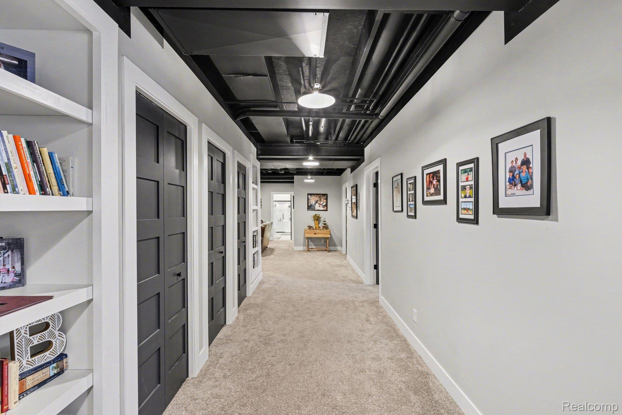 9084 Copper Ridge Drive Davison, MI 48423 - Photo 31 of 42 Hallway with light colored carpet and baseboards