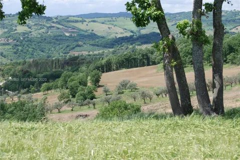 a view of a houses with beach and ocean view