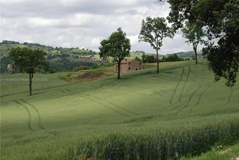a view of an outdoor space and tennis court
