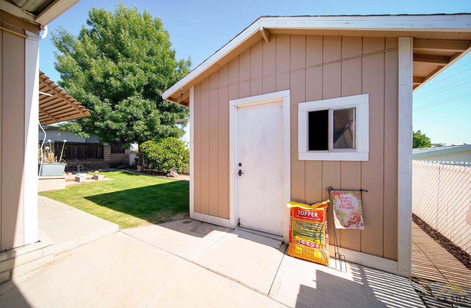 Undisclosed Address Bakersfield, CA 93308 - Photo 22 of 25 a backyard of a house with seating space