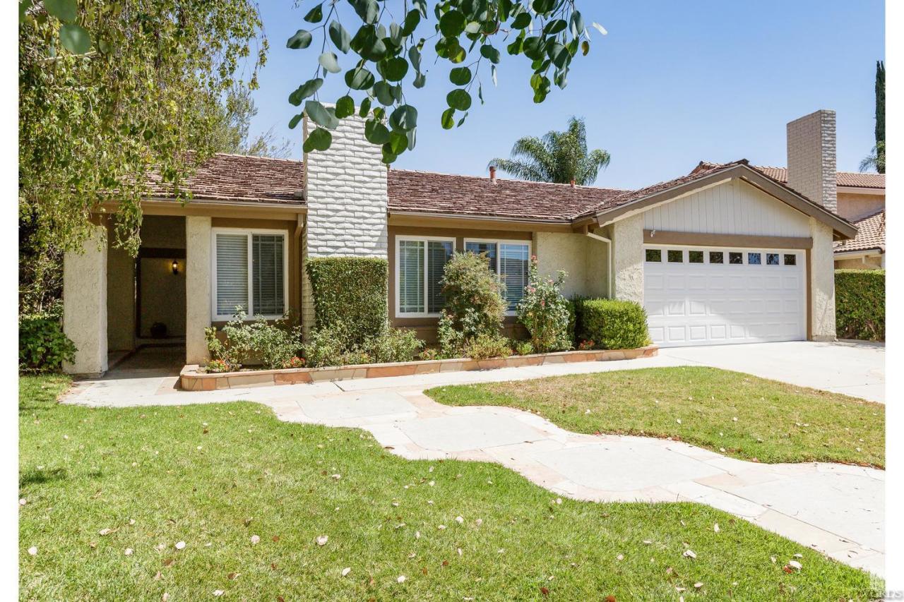 5534 Parkmor Road Calabasas, CA 91302 - Photo 1 of 29 a front view of a house with garden