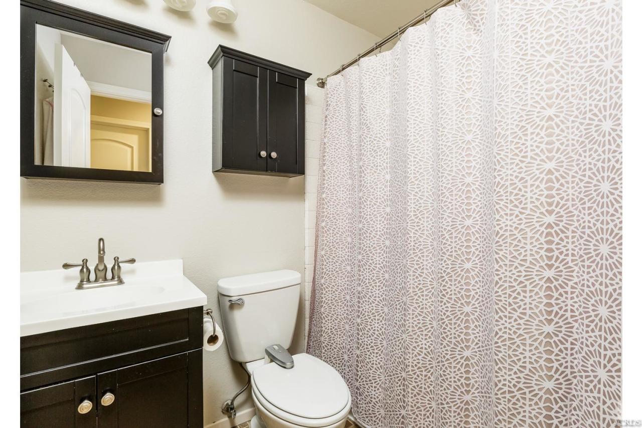 5534 Parkmor Road Calabasas, CA 91302 - Photo 23 of 29 a bathroom with a sink a toilet and mirror