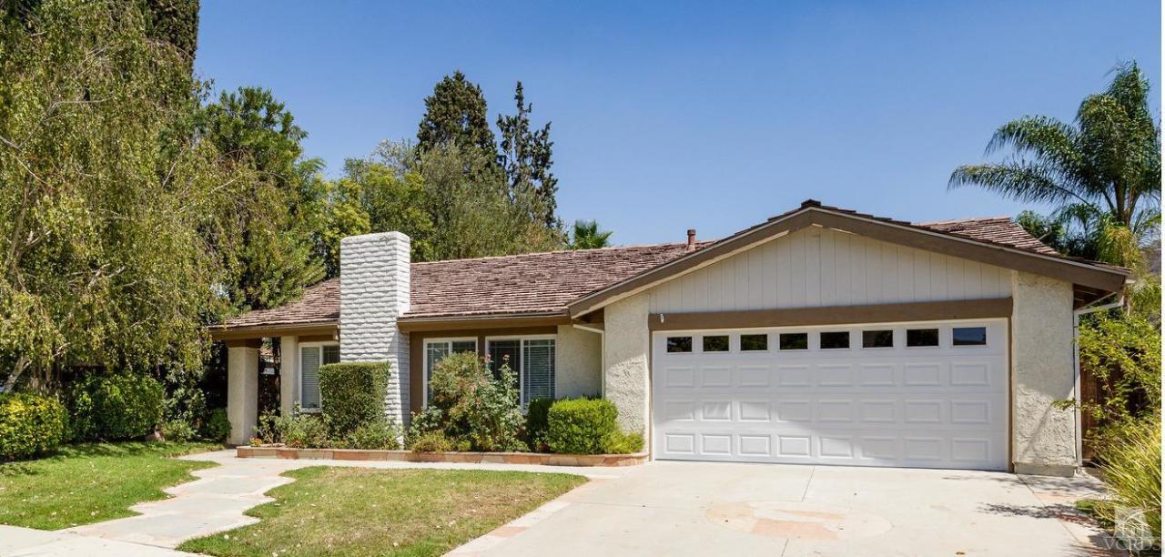 5534 Parkmor Road Calabasas, CA 91302 - Photo 8 of 29 front view of a house with a yard
