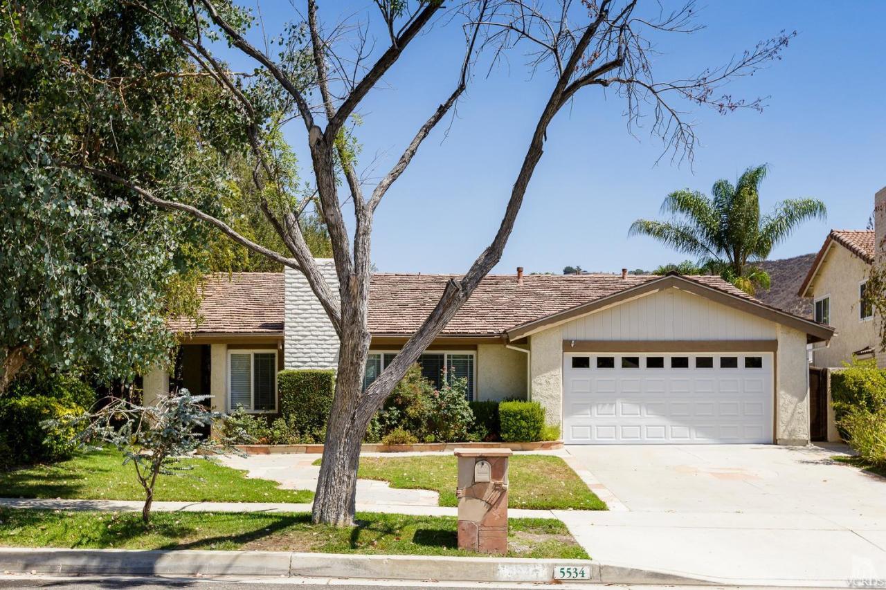5534 Parkmor Road Calabasas, CA 91302 - Photo 9 of 29 a view of house with yard