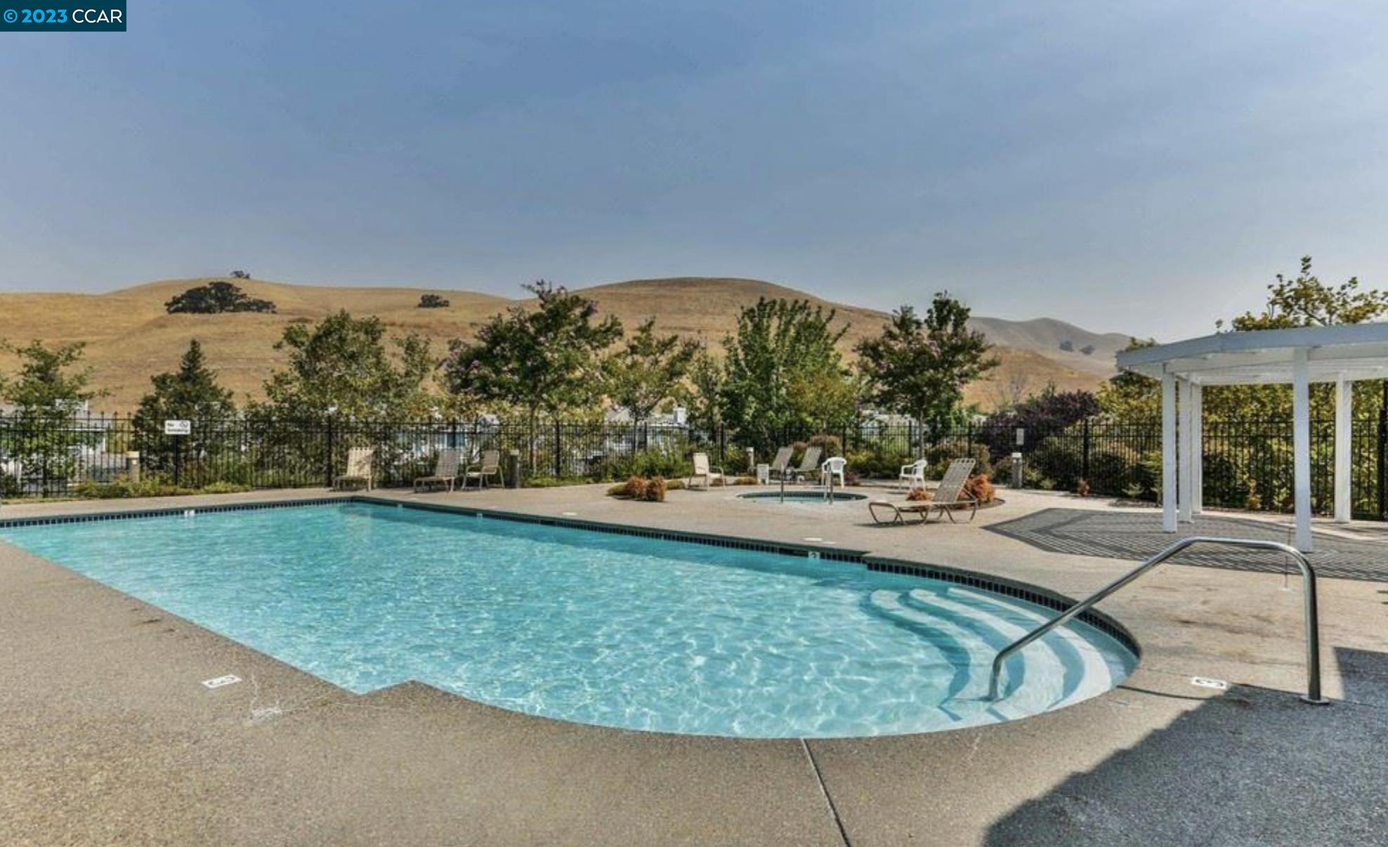 3505 Coyote Circle Clayton, CA 94517 - Photo 14 of 16 a view of a swimming pool with a yard