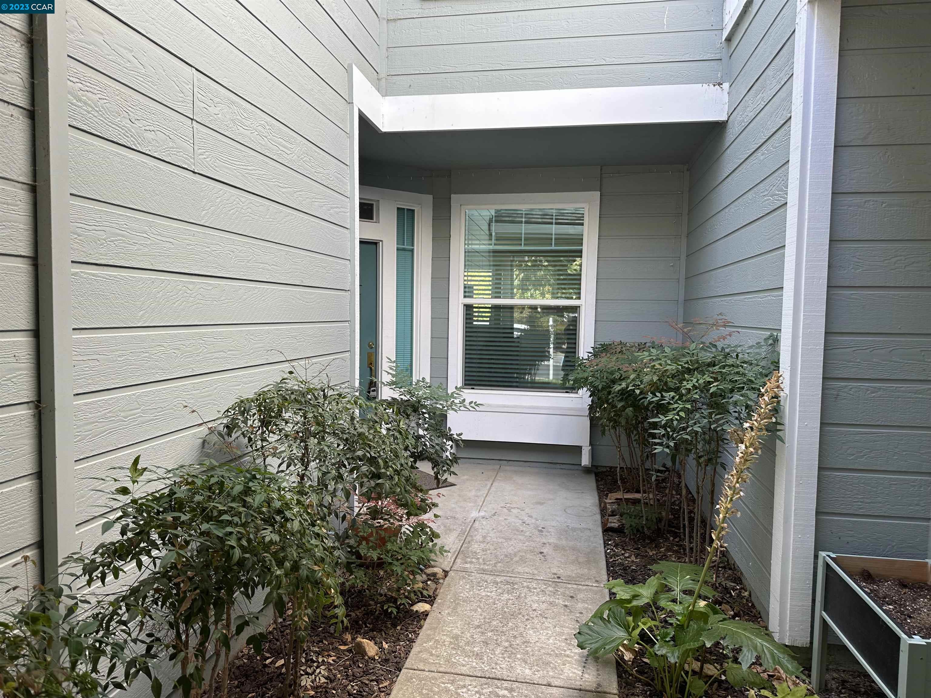 3505 Coyote Circle Clayton, CA 94517 - Photo 2 of 16 a view of a pathway besides a house