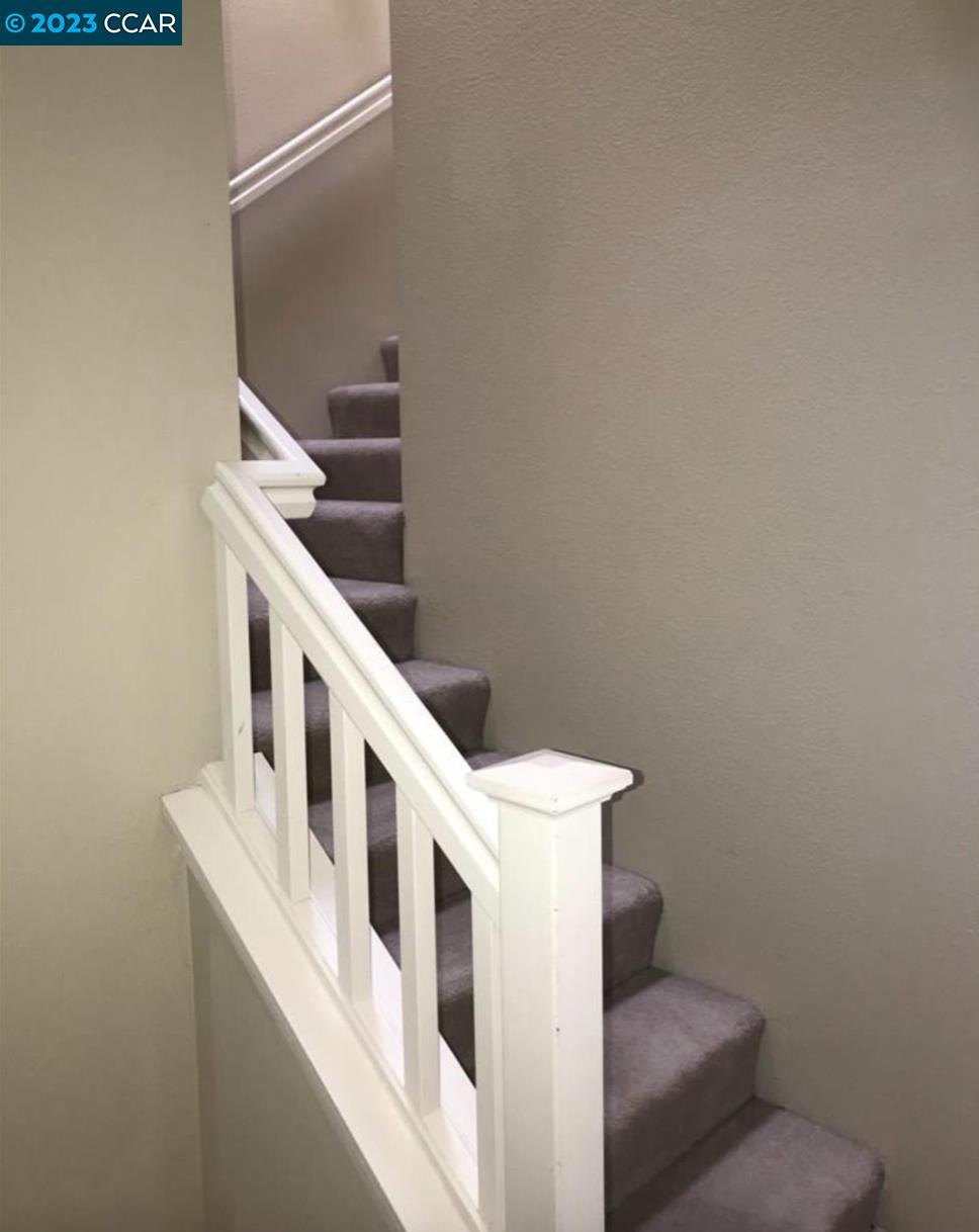 3505 Coyote Circle Clayton, CA 94517 - Photo 8 of 16 a view of a hallway with stairs