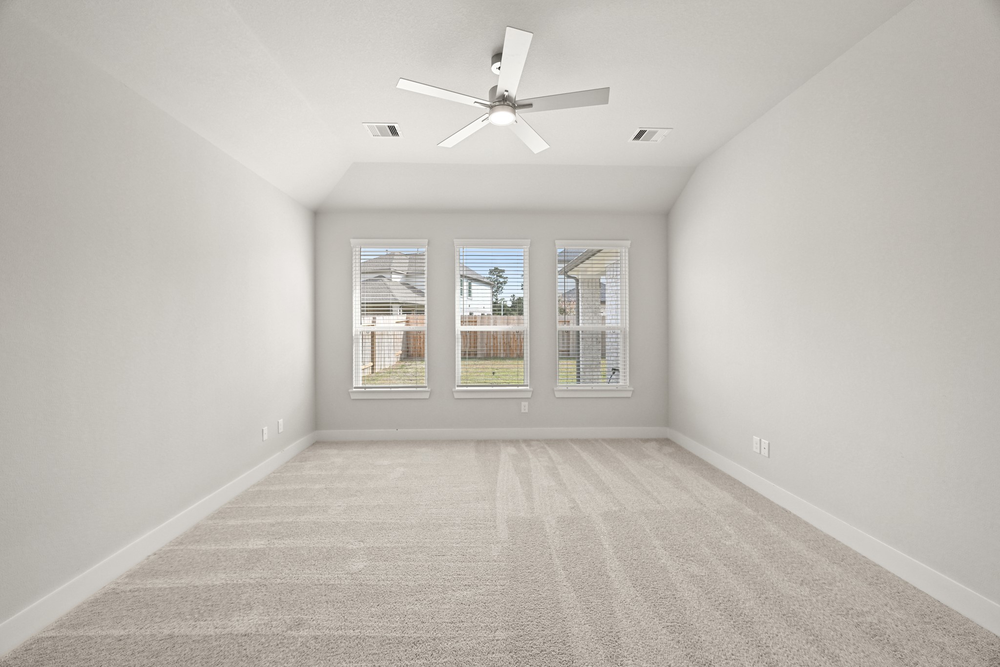 3308 Pin Cherry Lane Conroe, TX 77301 - Photo 21 of 45 a view of an empty room with a window