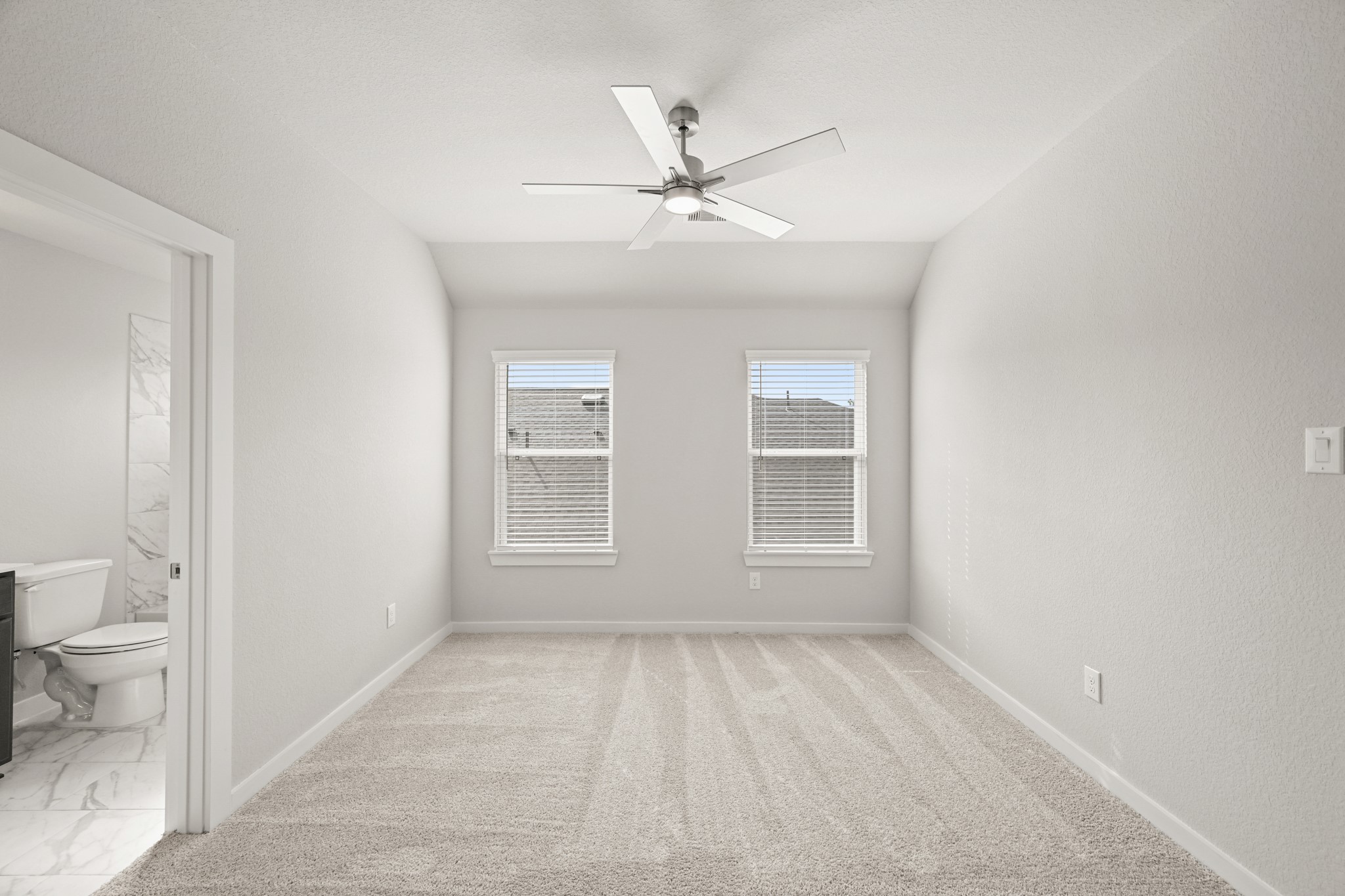 3308 Pin Cherry Lane Conroe, TX 77301 - Photo 23 of 45 wooden floor in an empty room with a window