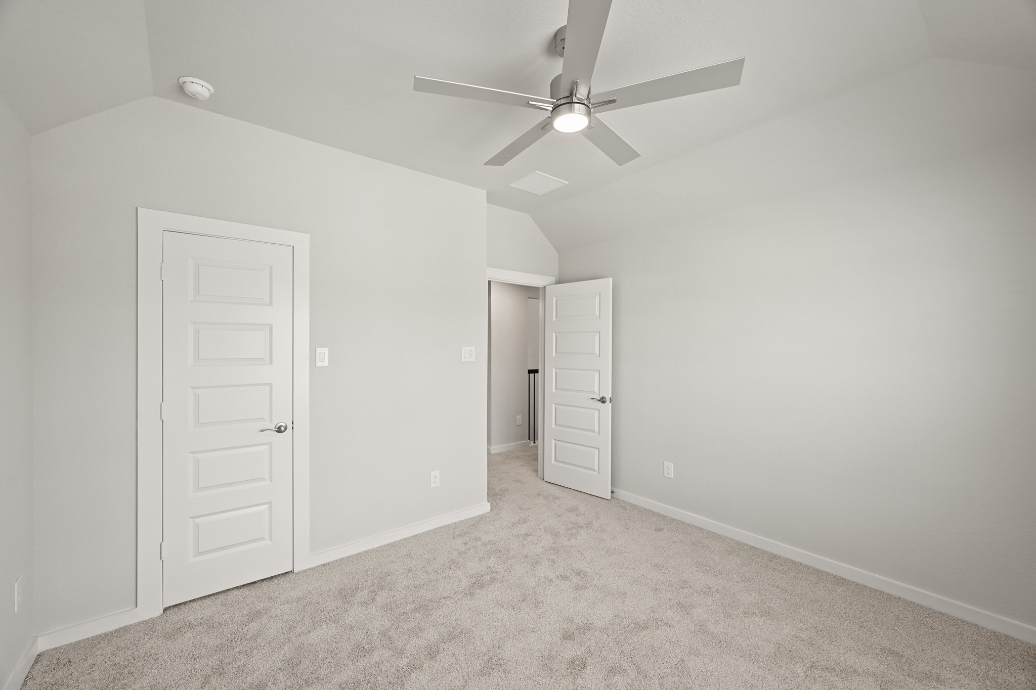 3308 Pin Cherry Lane Conroe, TX 77301 - Photo 32 of 45 an empty room with closet and fan