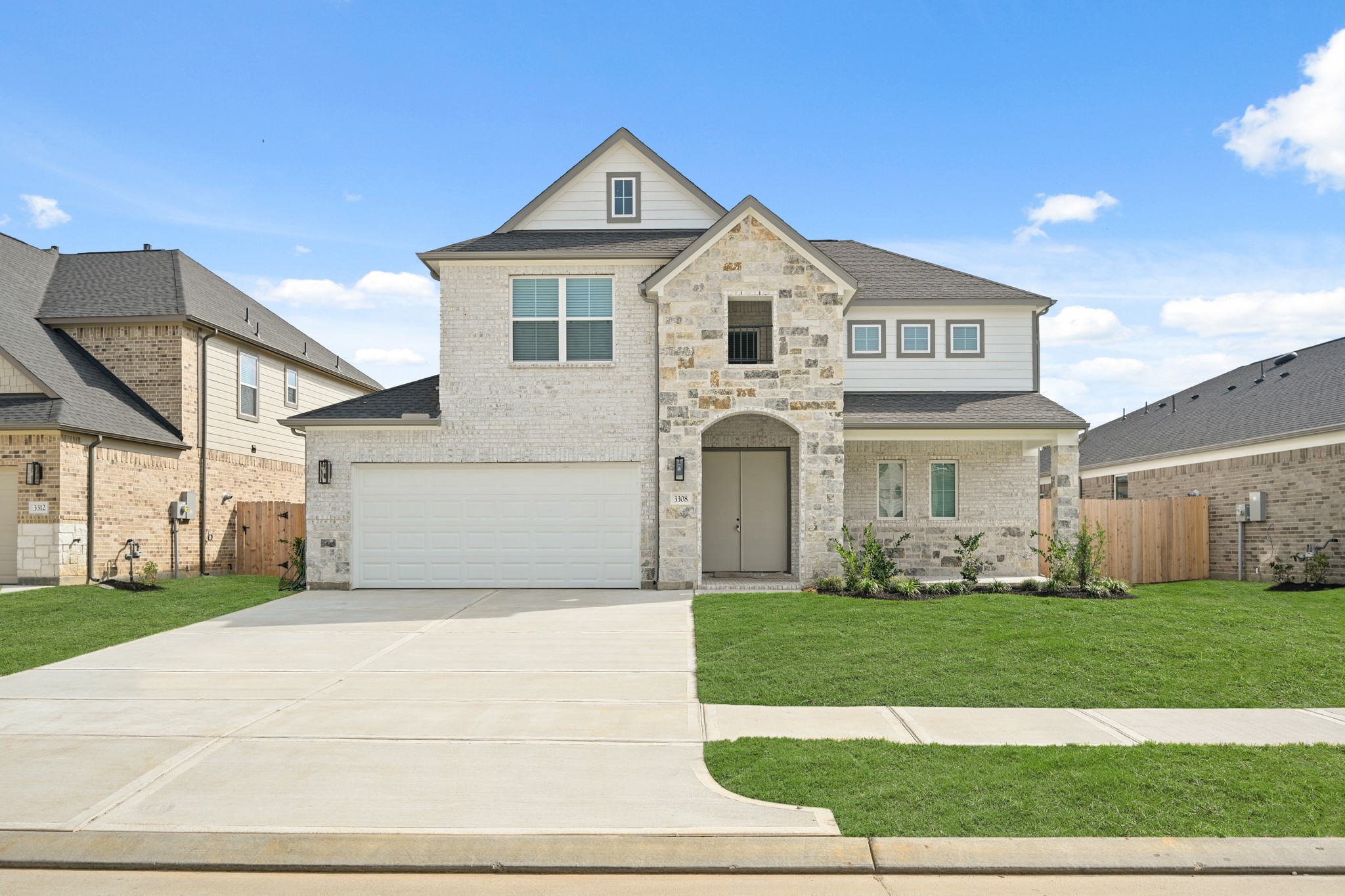 3308 Pin Cherry Lane Conroe, TX 77301 - Photo 42 of 45 a view of white house with a yard