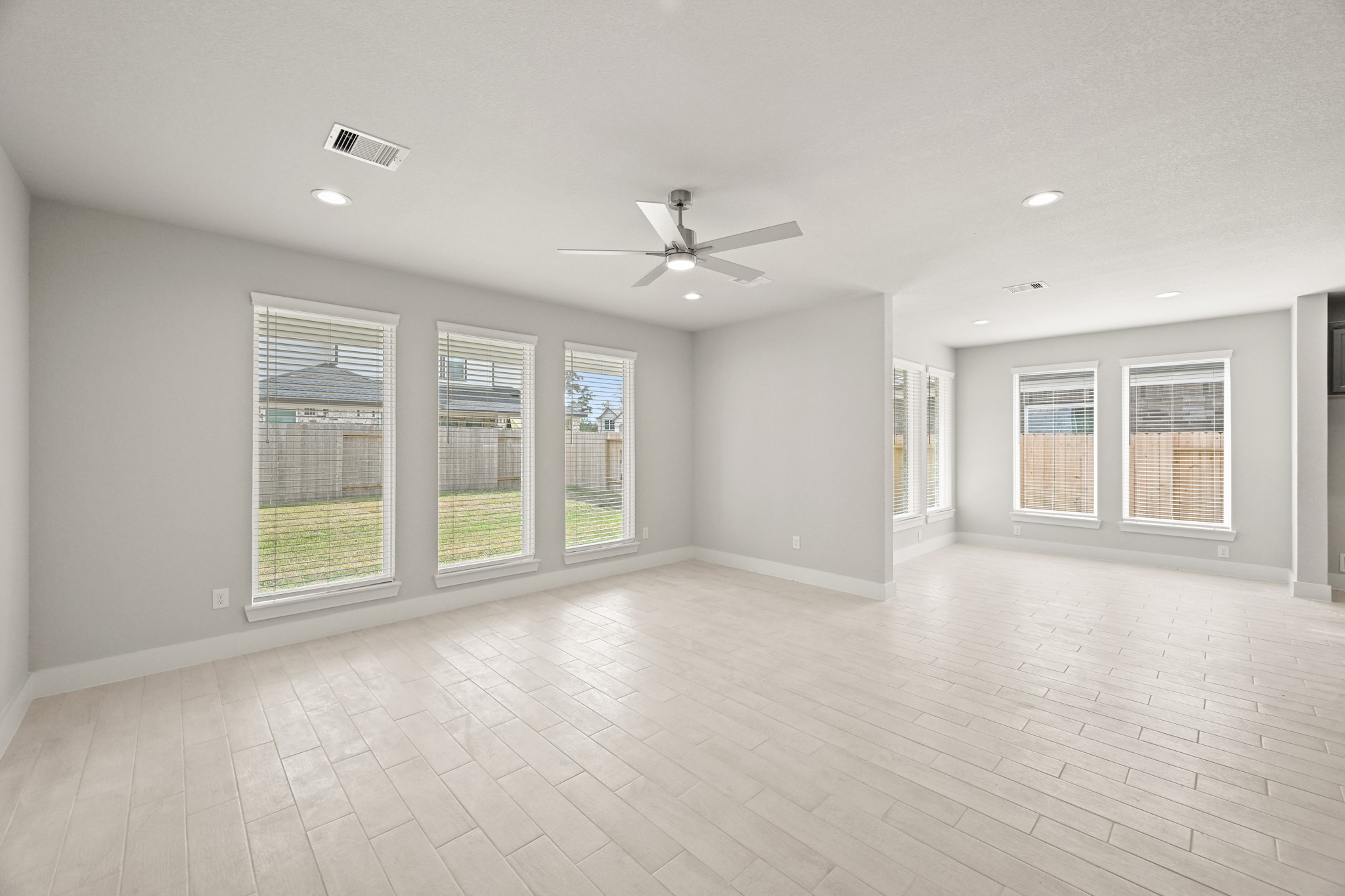 3308 Pin Cherry Lane Conroe, TX 77301 - Photo 7 of 45 a view of an empty room with a window