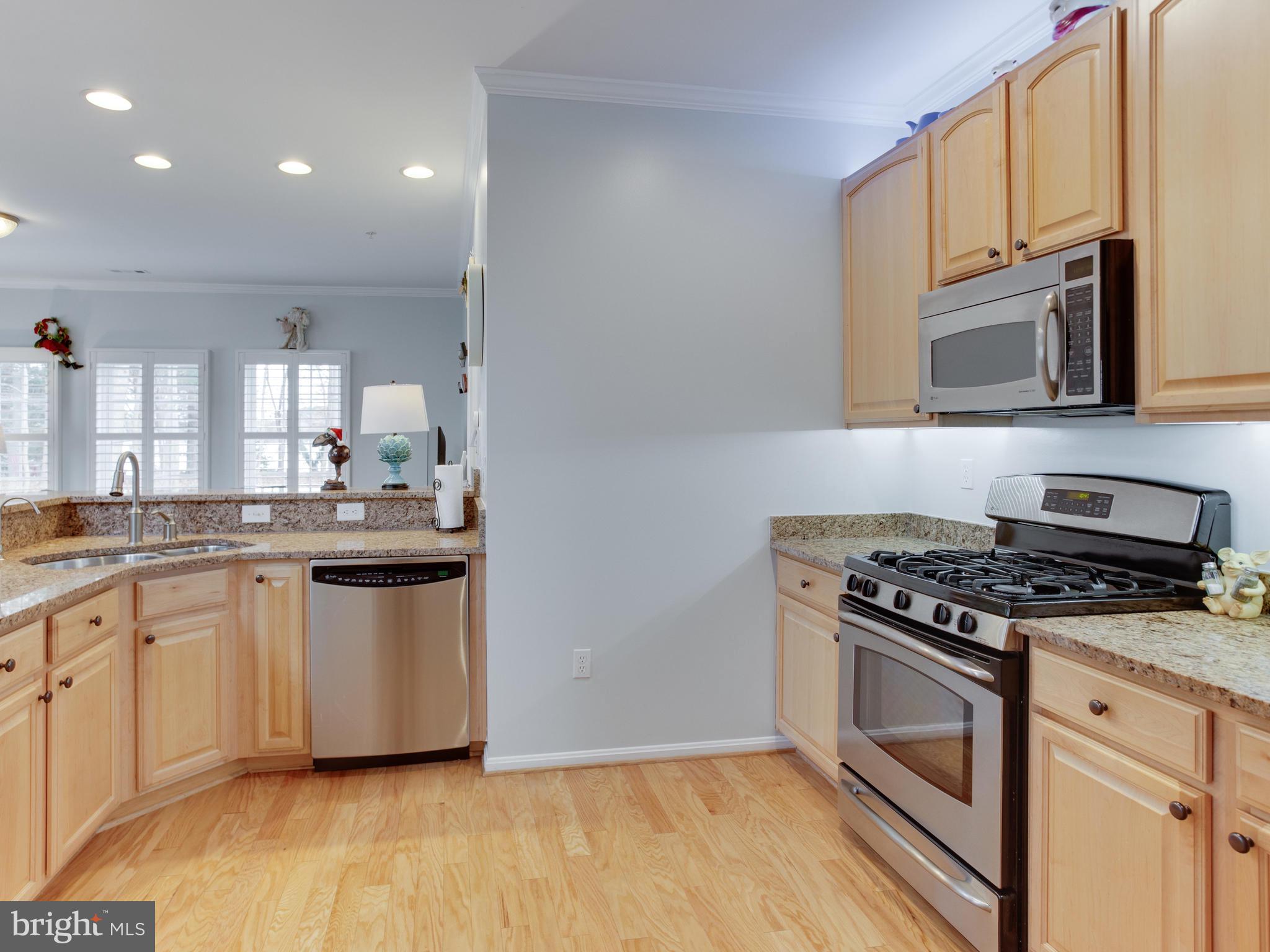 700 Ruxton Road, Unit 71 Solomons, MD 20629 - Photo 15 of 66 Granite counters, counter seating, SS
