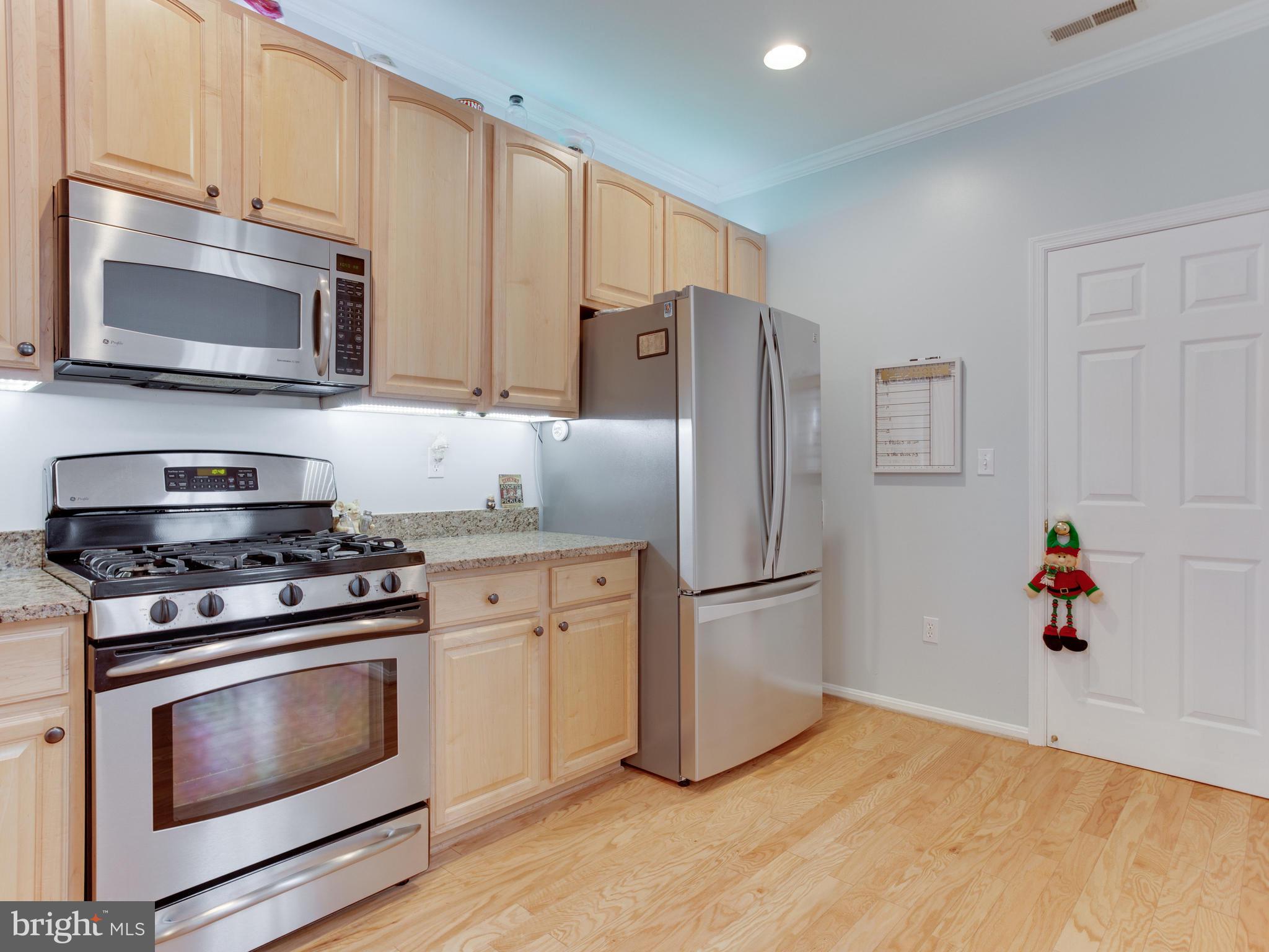 700 Ruxton Road, Unit 71 Solomons, MD 20629 - Photo 17 of 66 kitchen, door to laundry, garage