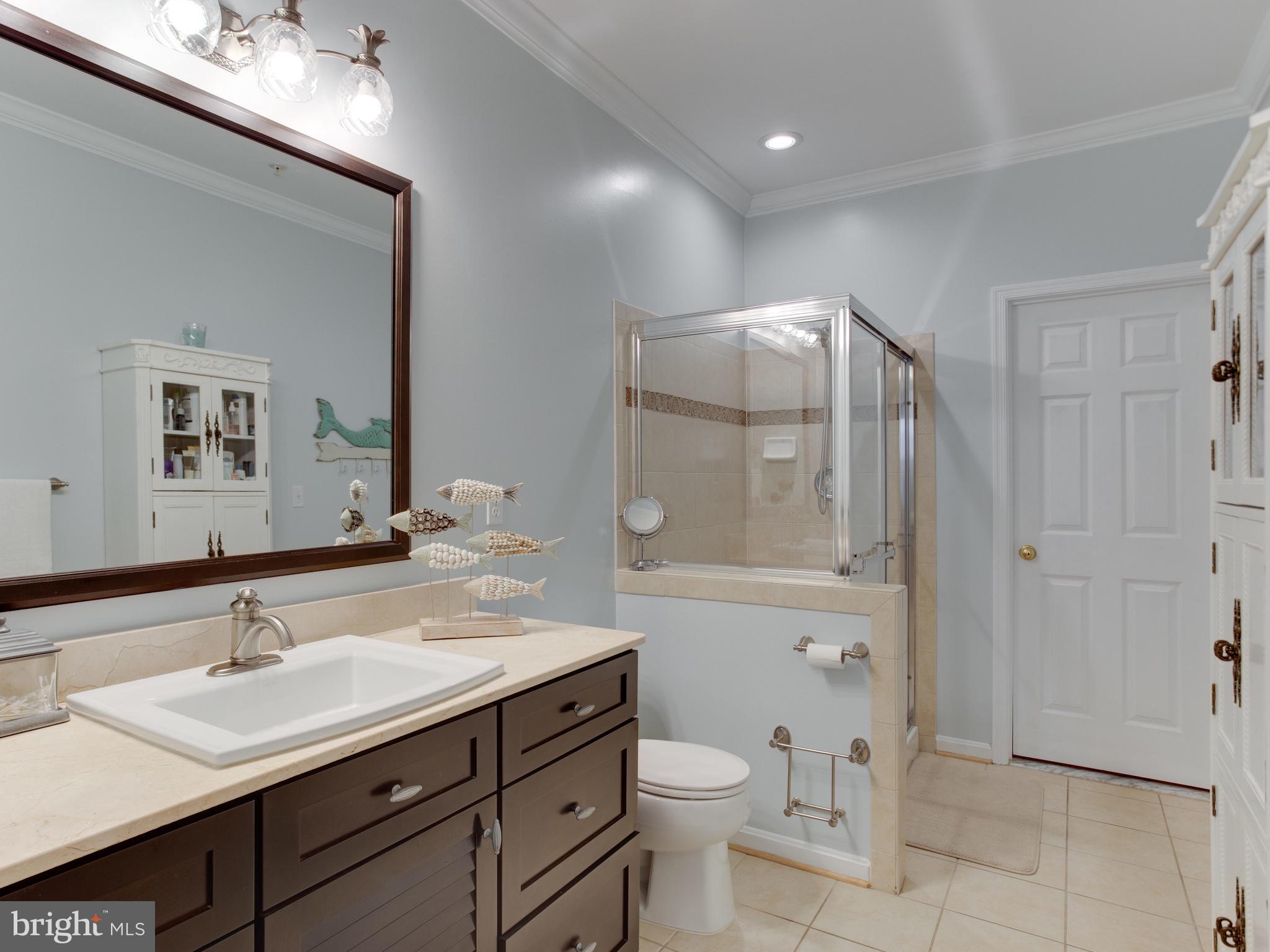 700 Ruxton Road, Unit 71 Solomons, MD 20629 - Photo 27 of 66 Master Bath, Tile floor, Large shower