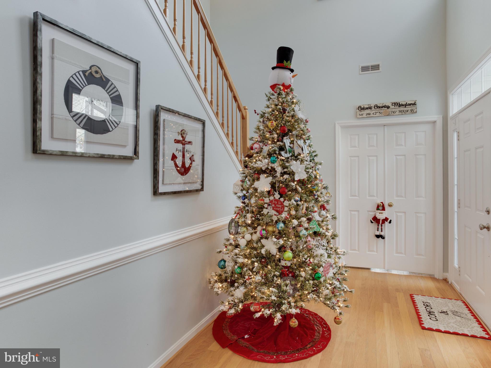 700 Ruxton Road, Unit 71 Solomons, MD 20629 - Photo 10 of 66 Entryway, 2 story ceilings, hardwood flooring