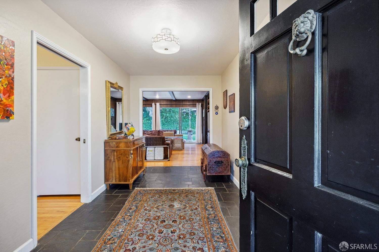 57 Ridge View Drive Atherton, CA 94027 - Photo 11 of 33 a living room with furniture and a rug
