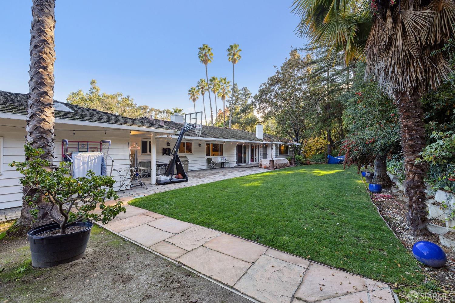 57 Ridge View Drive Atherton, CA 94027 - Photo 18 of 33 a view of a house with backyard and a garden