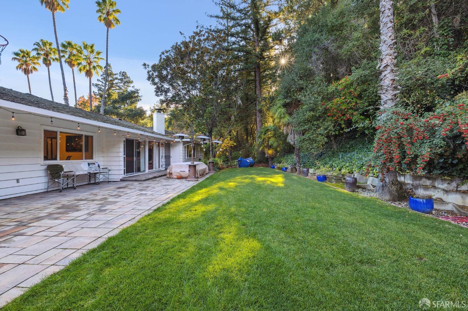 57 Ridge View Drive Atherton, CA 94027 - Photo 19 of 33 a view of a house with backyard and sitting area