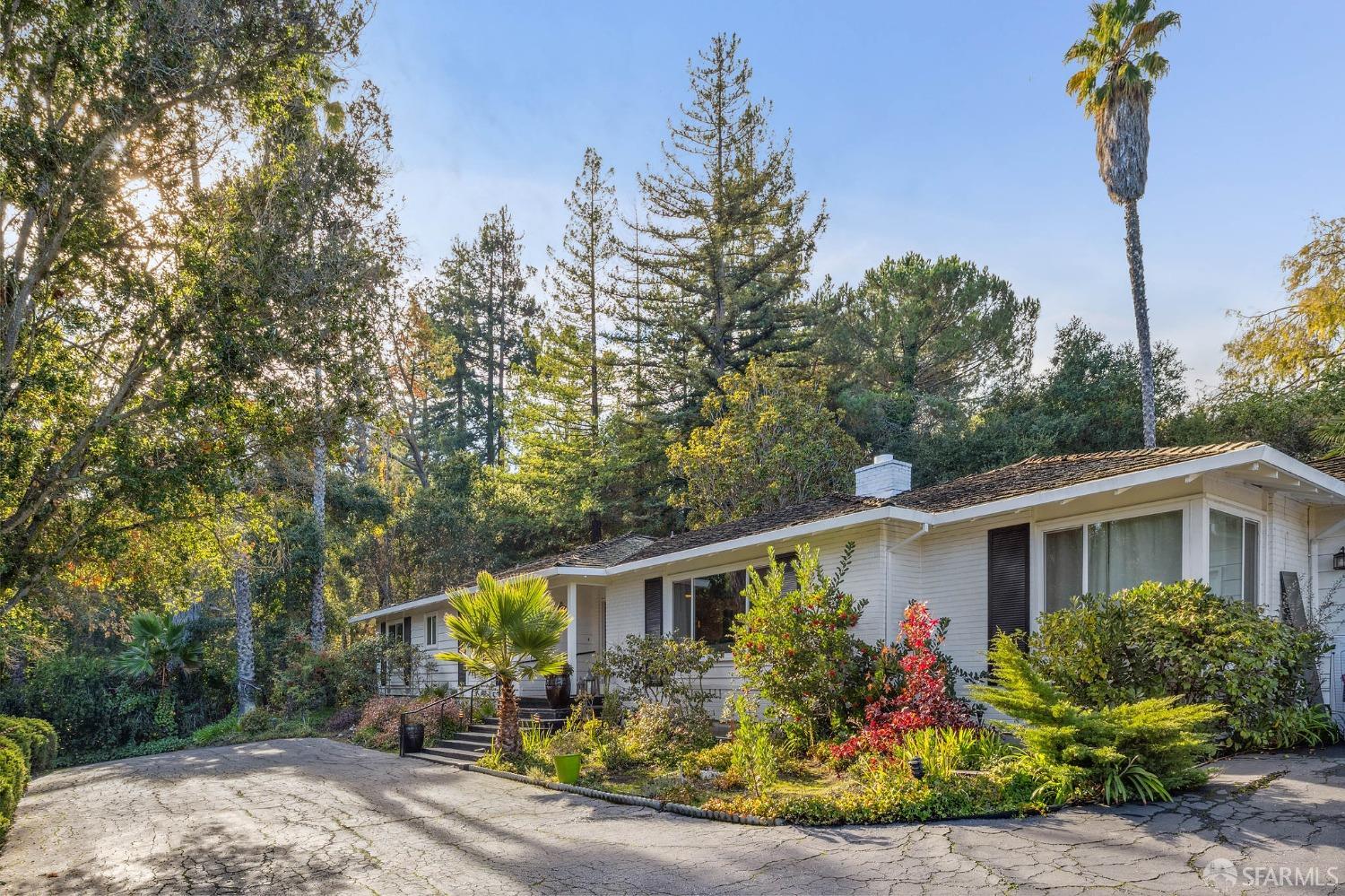57 Ridge View Drive Atherton, CA 94027 - Photo 2 of 33 front view of a house with a patio