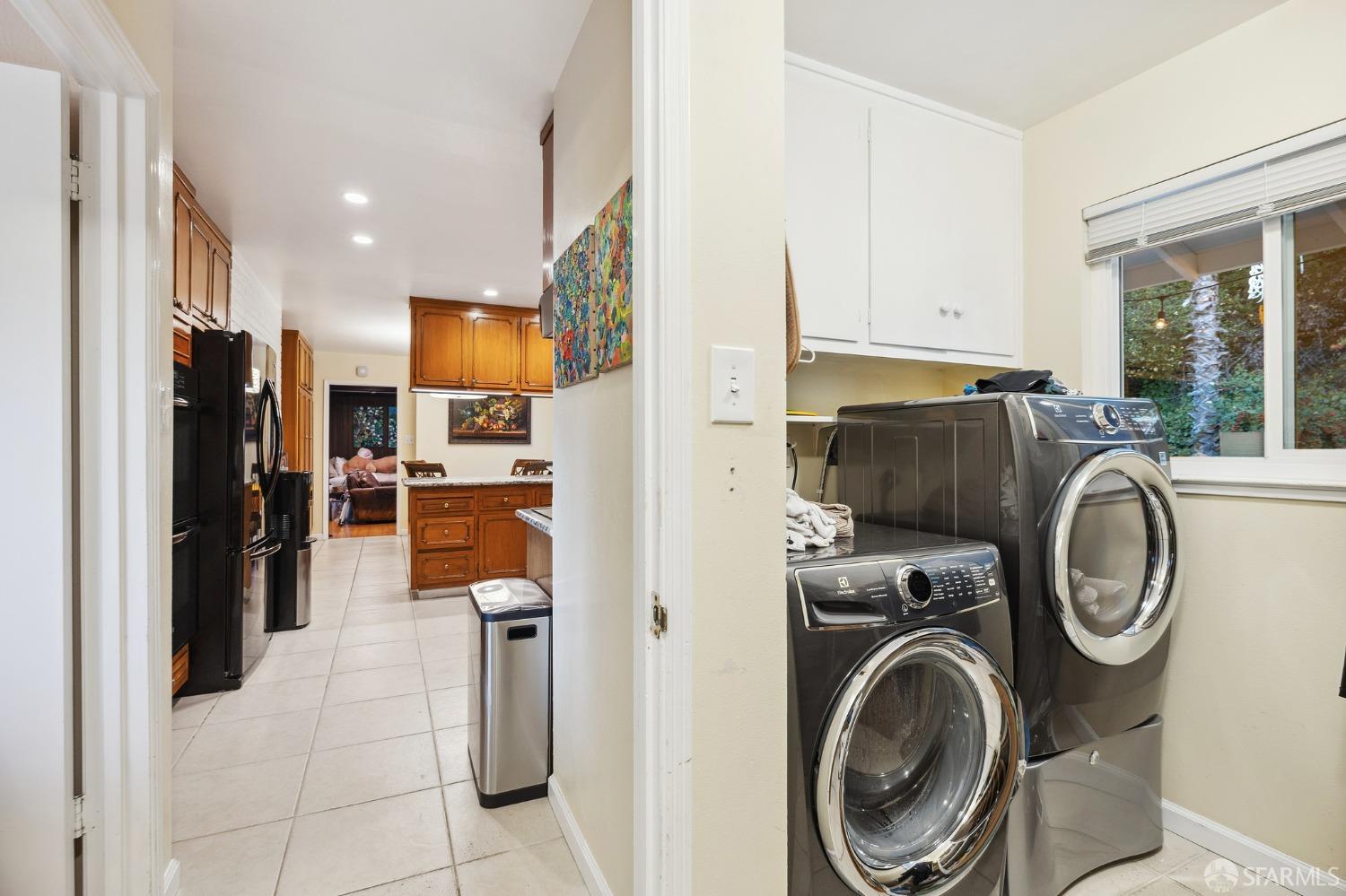 57 Ridge View Drive Atherton, CA 94027 - Photo 28 of 33 a view of a kitchen with washer and dryer