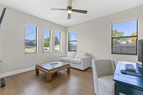 a living room with furniture and a window