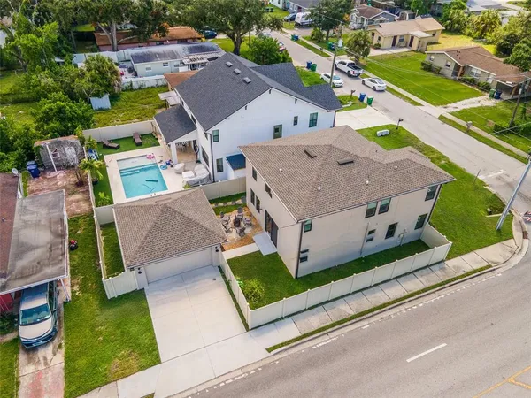 an aerial view of a house with a garden