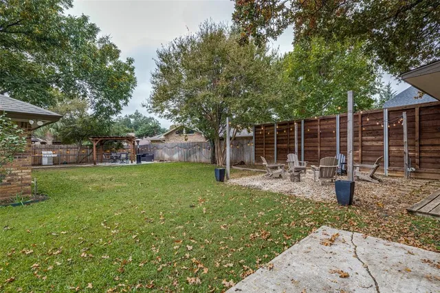 a view of a garden with patio