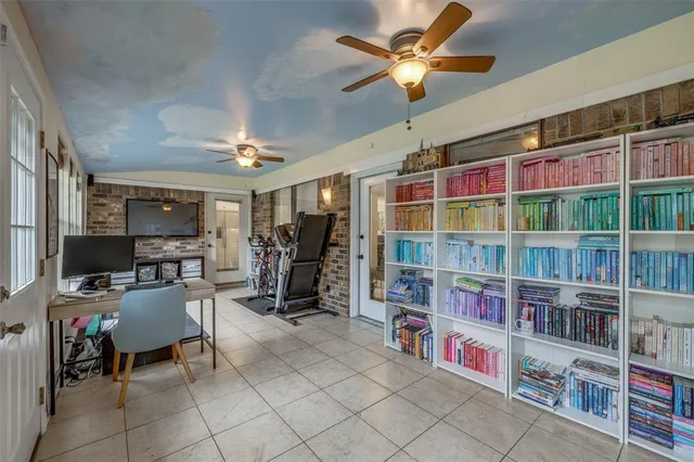 a view of a workspace with furniture