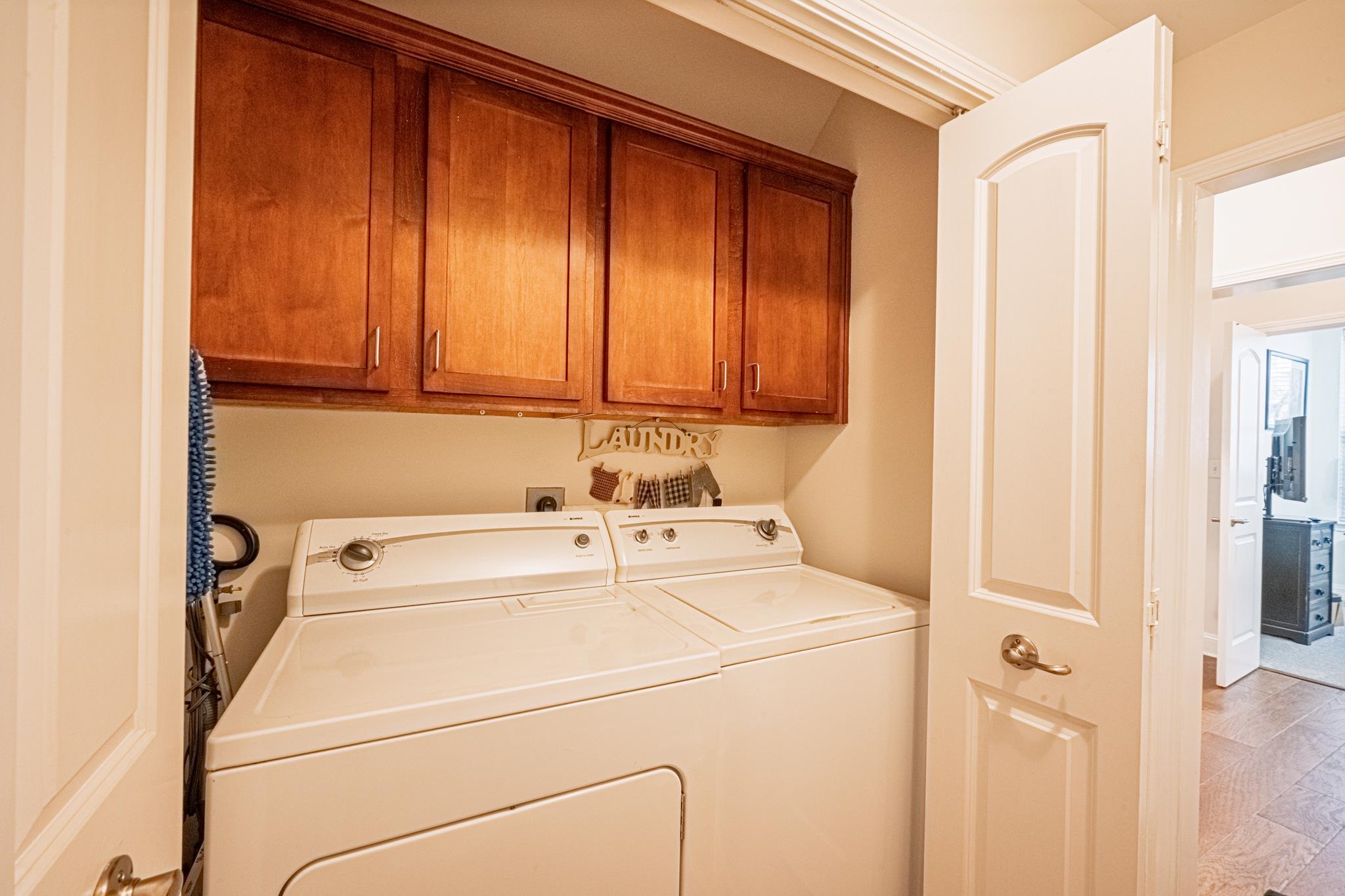 75 Shoemaker Court, Unit 105 Memphis, TN 38103 - Photo 18 of 25 a utility room with dryer and washer