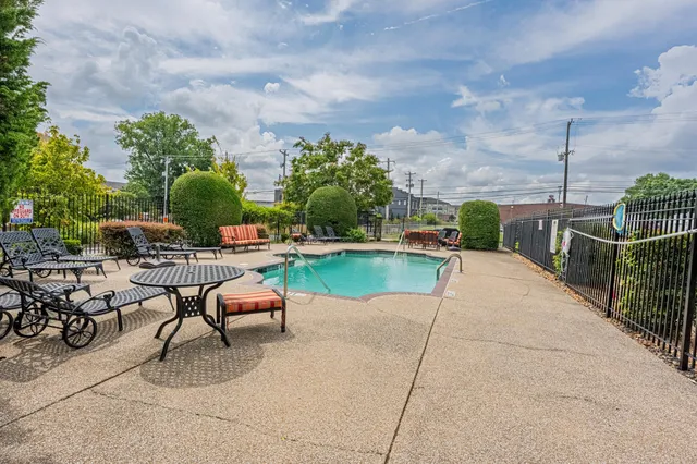a view of a swimming pool with a terrace